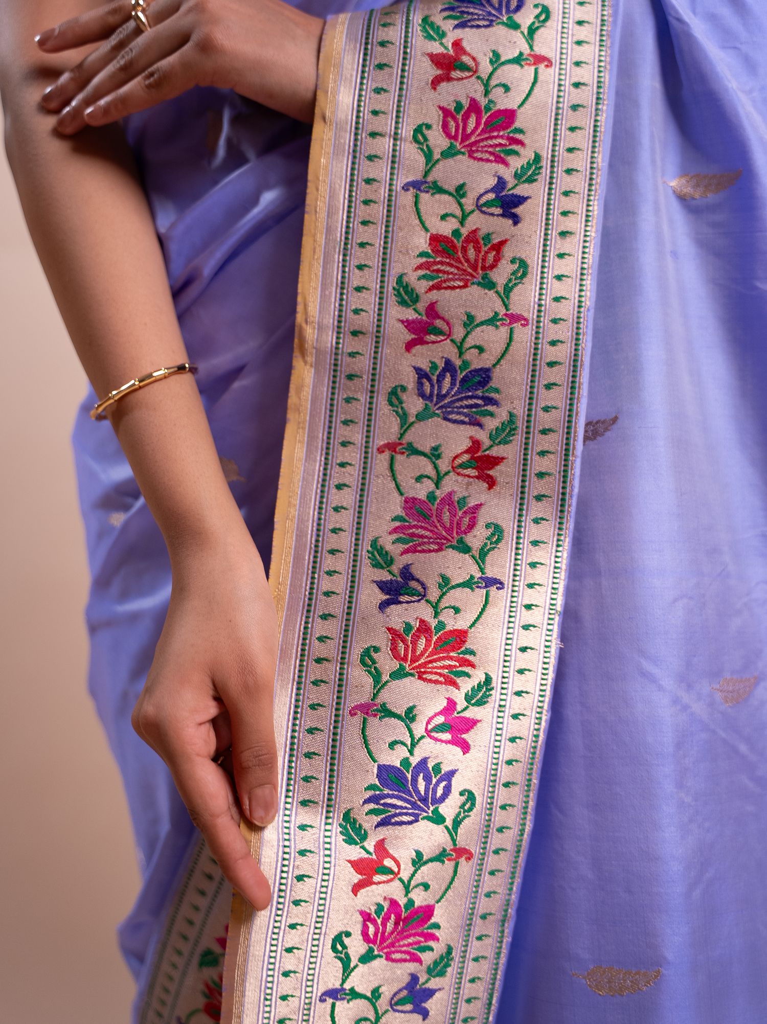 The Sacred Frame: Why Lotus Borders Transform Any Saree Into Art